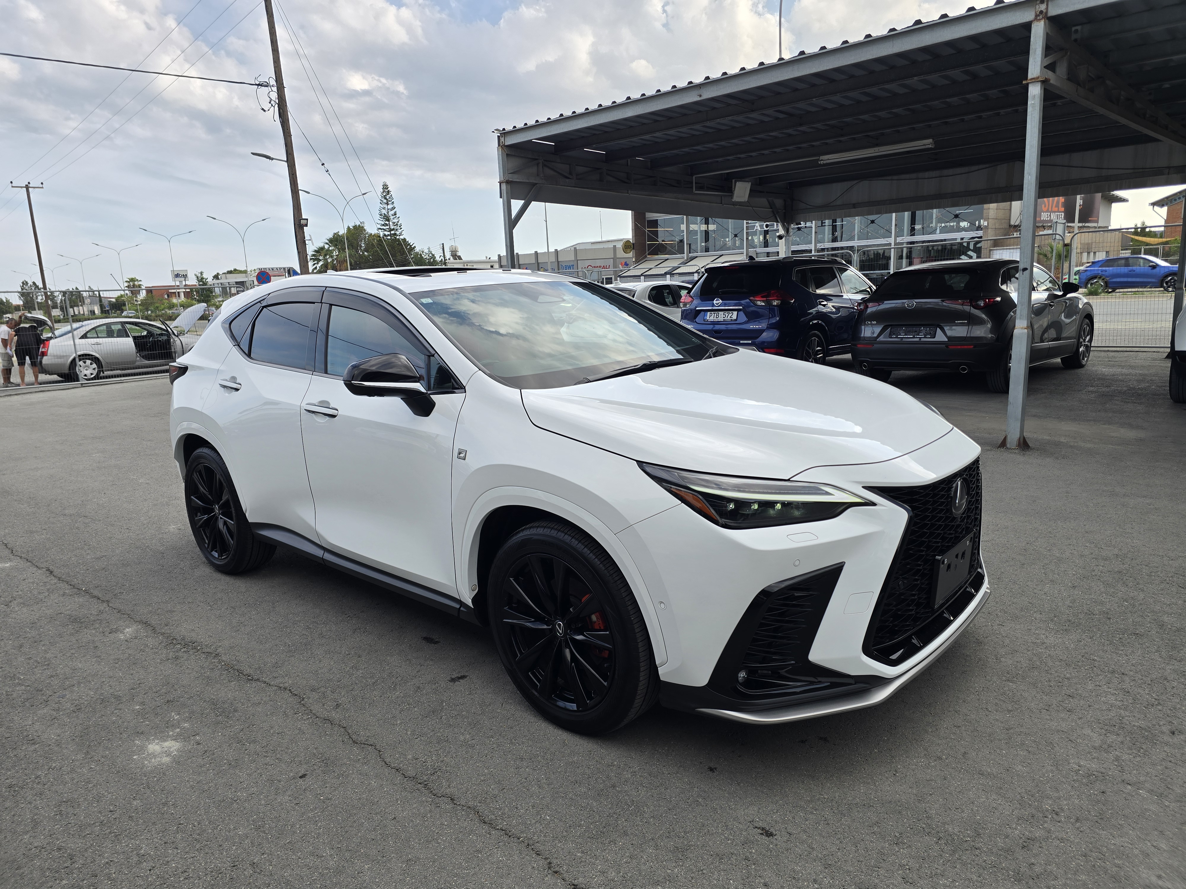 2023 Lexus NX350h F-Sport in White Pearl